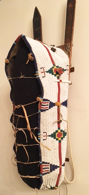 A Cheyenne Beaded Hide Baby Carrier on Boards