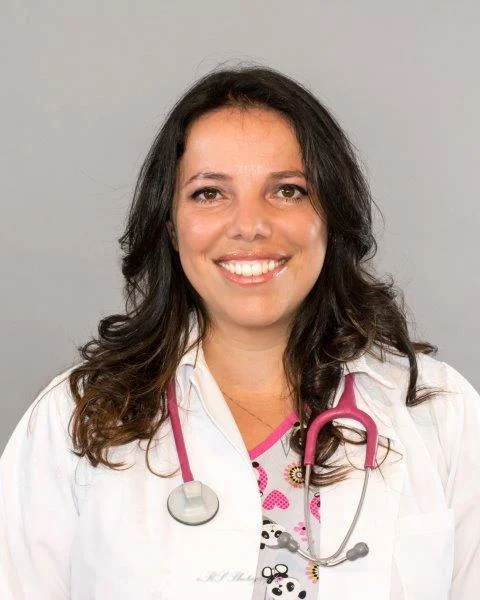 Dr. Orso graduate from University of Sao Paulo, Brazil in 1996. Right after that, she moved to the US and completed a 2 year fellowship at University of Pennsylvania Neurology's Department. She then relocated to Purdue University in West Lafayette, IN where she completed the ECFVG Certification program, obtaining her Veterinary License to practice in the US in 2001. In her quest for a bigger city, away from the cold weather and closer to home (Brazil), she ended up in Houston in 2009. Her experiences include private practice, working at a feline mobile Spay/Neuter clinic and shelter medicine. She is also certified in Canine Rehabilitation. While not at Panda's, Dr. Orso likes to spend time with her daughter Bri, her little rescue pups Molly (St. Bernard!) and Xuxa (Mastiff!), Buddy (Mastiff), Lilly (a quarter horse) and her 1 eye turtle, Tata.