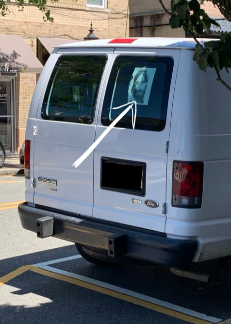 Reassured By Jesus on the back of a van