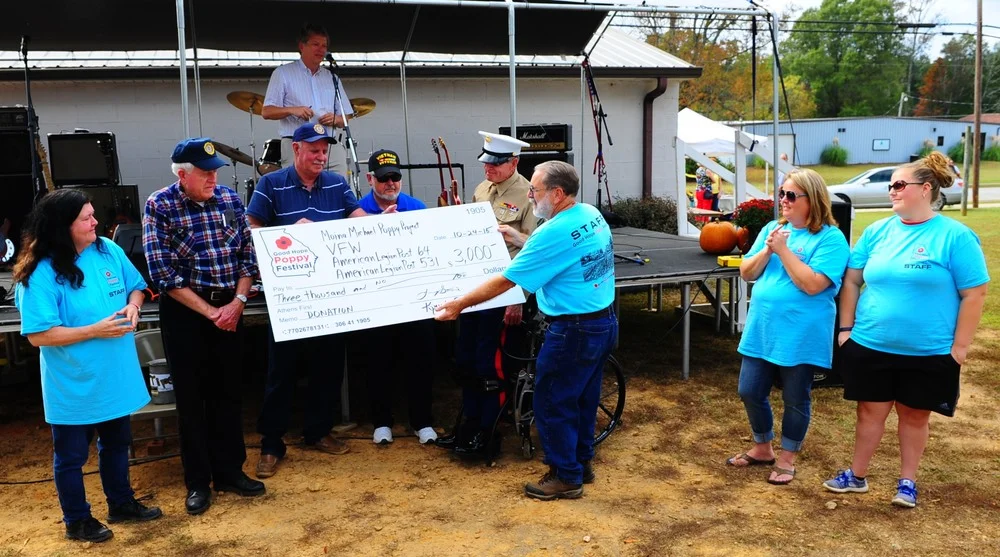 2015 Good Hope Poppy Festival proudly presented $5,000 (after all proceeds were counted) to: Walton County Veterans Memorial & Moina Michael Poppy Project : All Terrain Chair Initiative