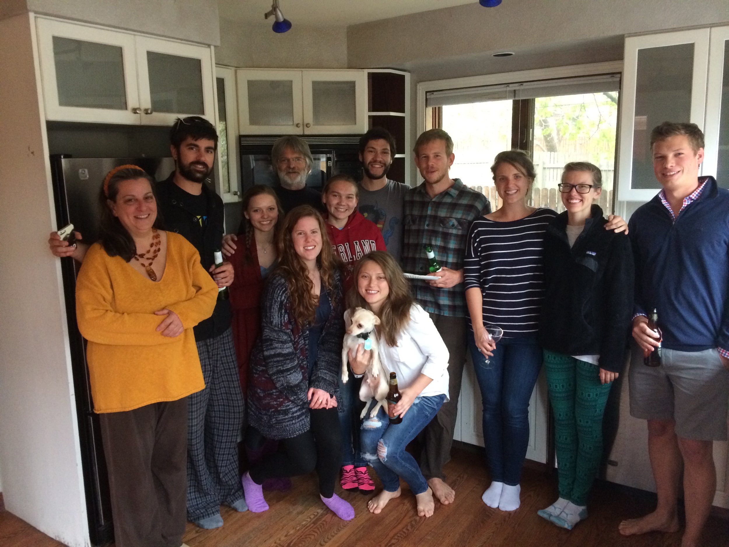 Dake Family (left side) sold 707 North at "attainable" cost to the next generation: Brad Smith and Kayley Dorsa (right side with roommates and friends).