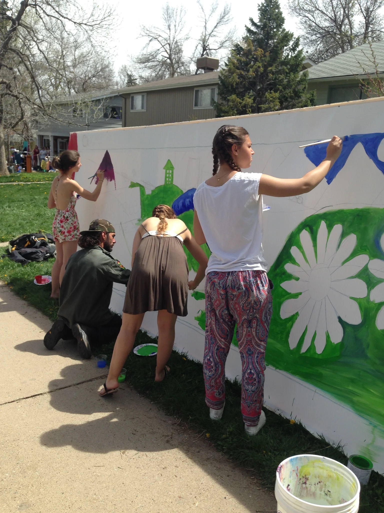 Mural painting during Fossil-Free Your Life North St. Block Party, Earth Day 2016