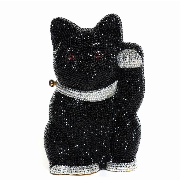 Judith Leiber Swarvorski Crystal Cat Minaudiere Clutch/ Fashionphile / $3,595 / Fashionphile will buy back for $1,762