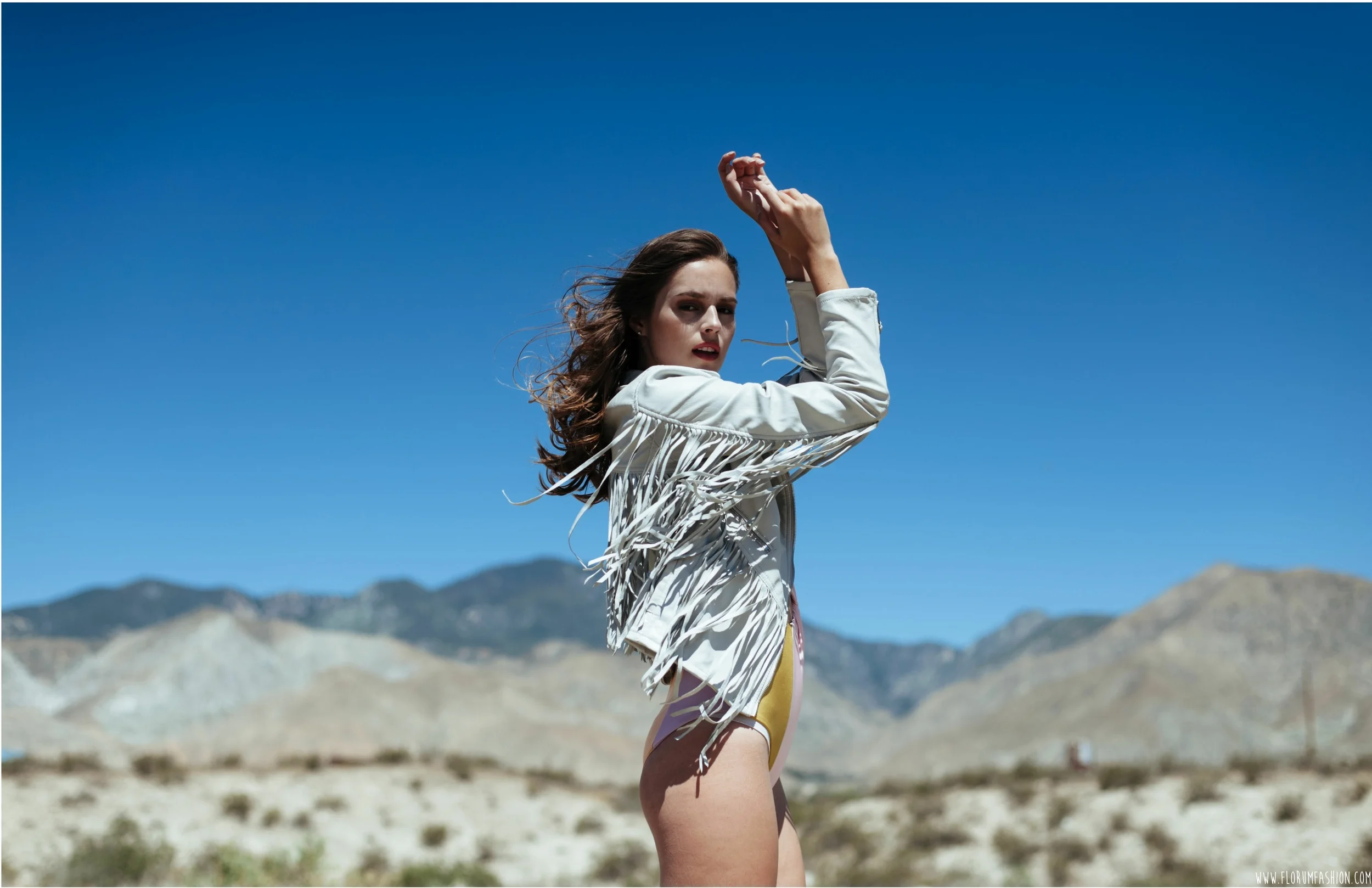 Bodysuit by Samantha Pleet / Vegan Fringe Jacket by BLANKNYC