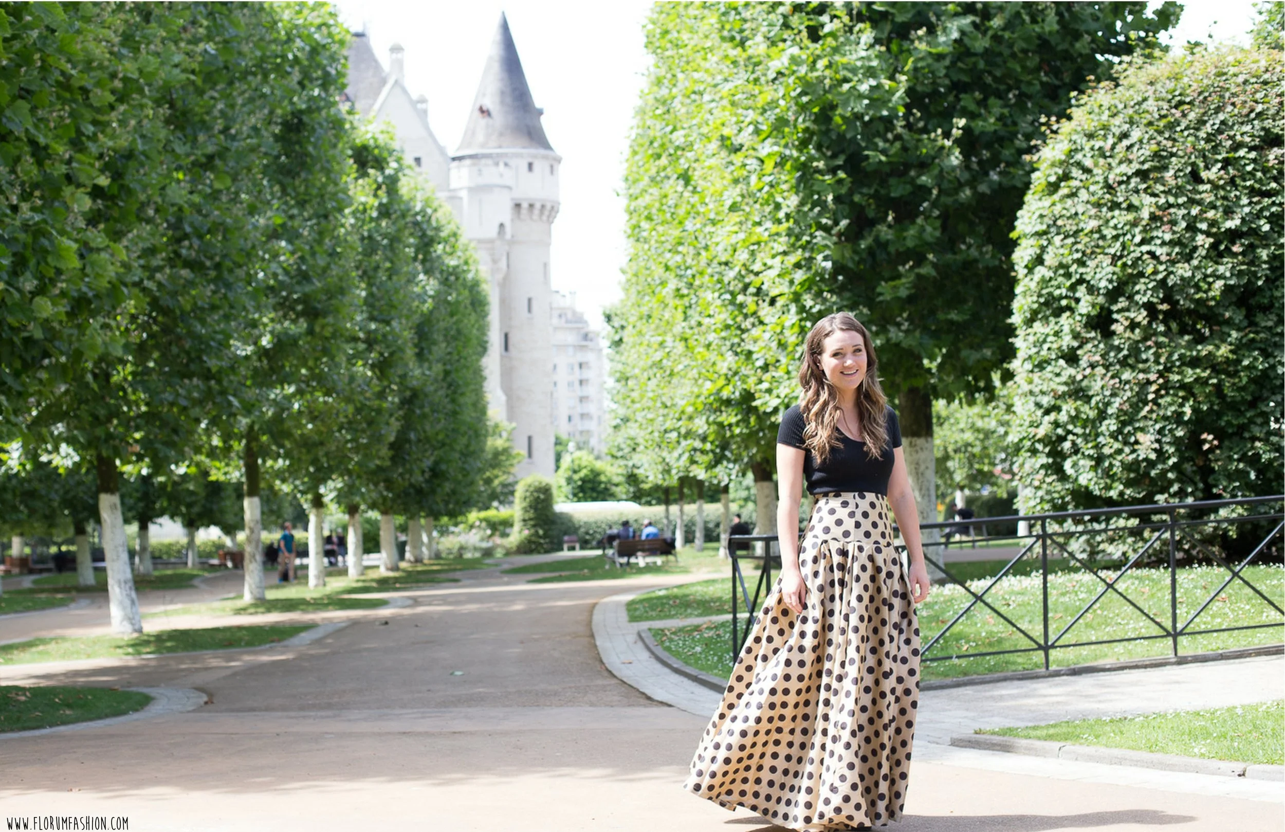 Noelle Lynne photographed by Dani Oshi in front of Halle Gate in Brussels, Belgium.