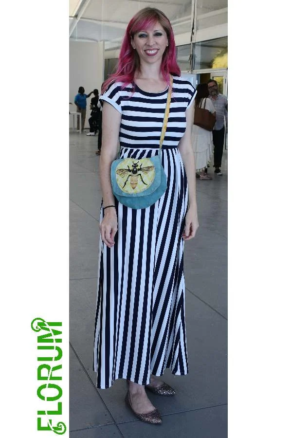 Colorful hair, stripes, and bumble bee cross body spotted on Melanie Oliva