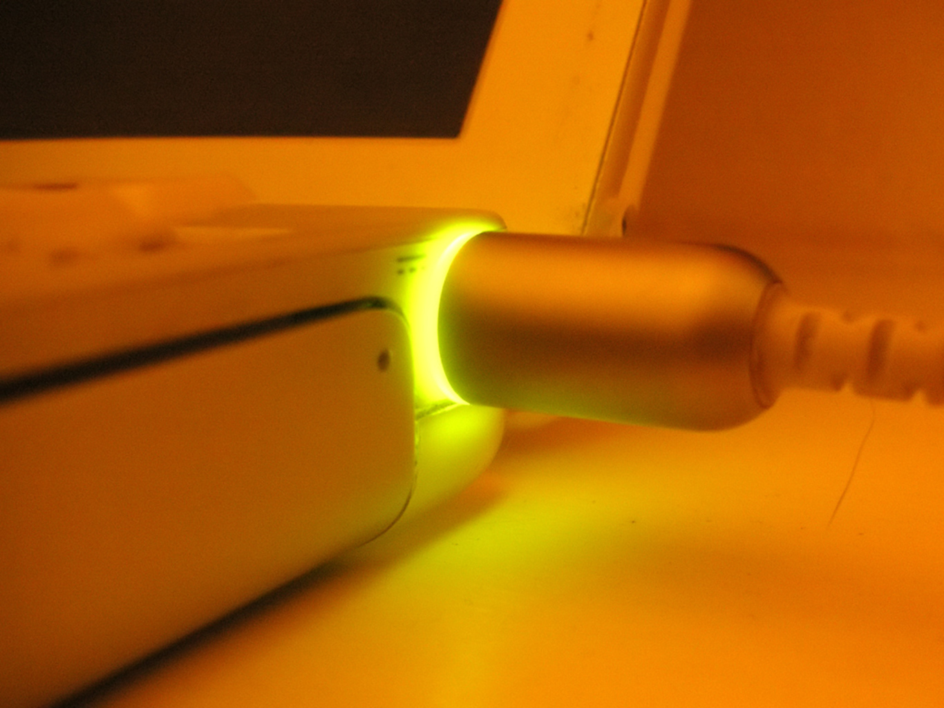 It’s best to keep your laptop plugged in if you’re using it, but only partially charged if it’s lying around unused. dtack/Flickr, CC BY