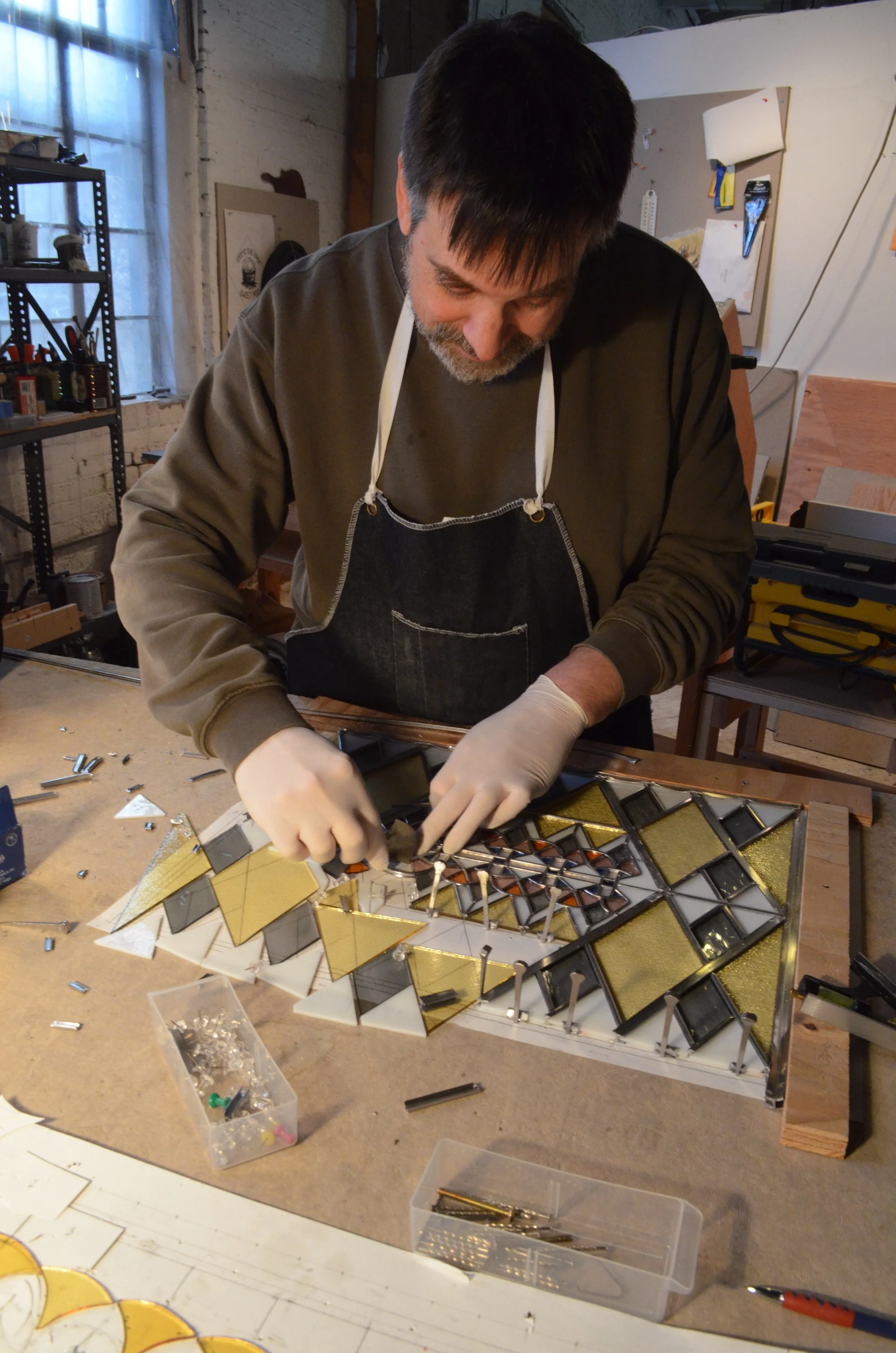 Brian glazing the most difficult part of his design.