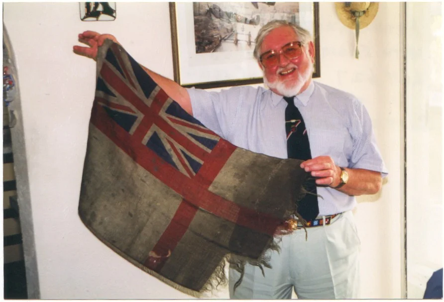 First Lieutenant Arthur Walters with LCT 627's ensign