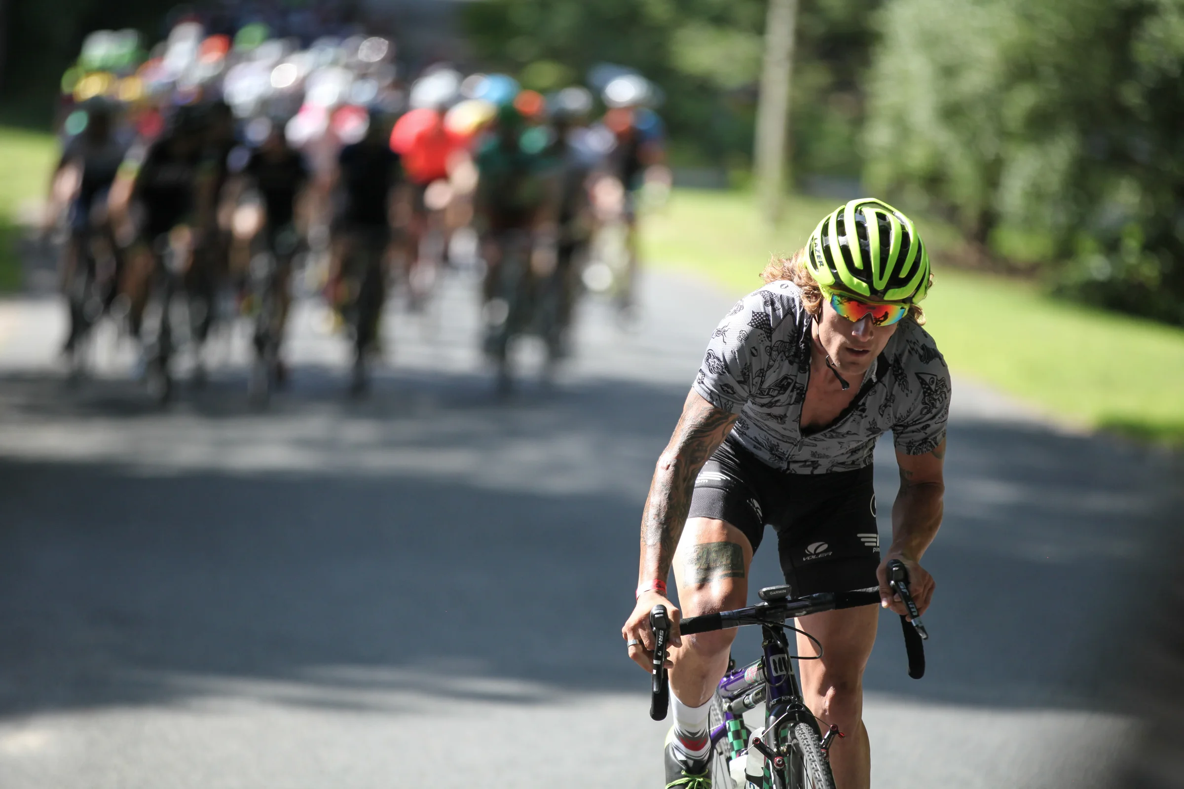 JAM Fund Alumus Anthony Clark surges ahead of the pack to ride the 88-mile Grand Hundo. Photo c. Meg McMahon.