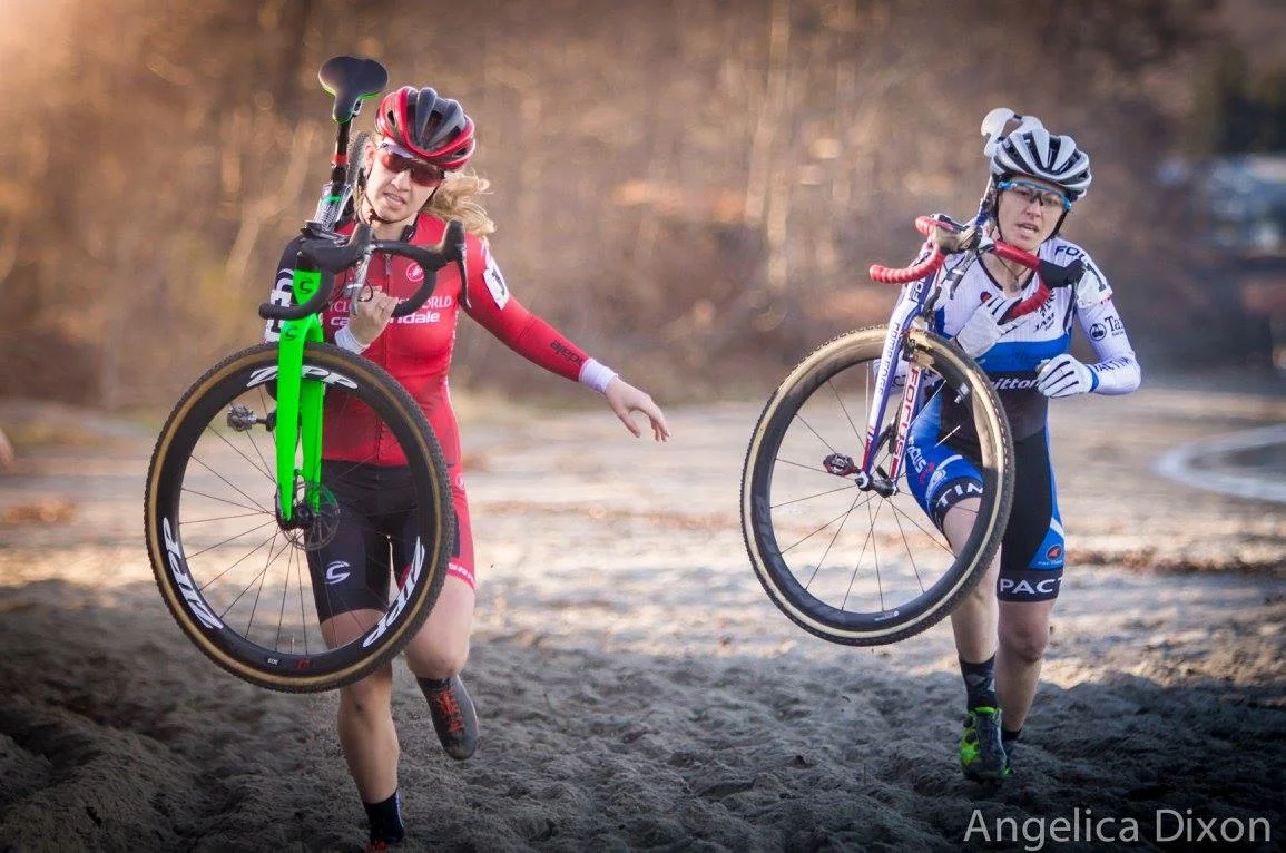 Jena Greaser and Emma White (Cyclocrossworld.com) ran through the sand during Sunday's NBX Gran Prix. Photo by Angelica Dixon.