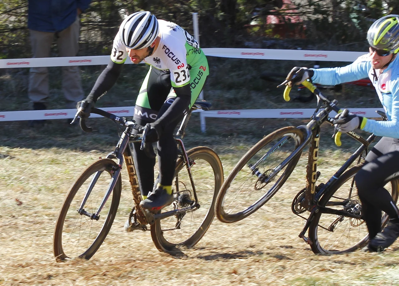 Al Donahue (JAM/NCC/Vittoria) climbs the steepest hill in the race on the second lap ahead of others running it. Photo by Vicky Sama.