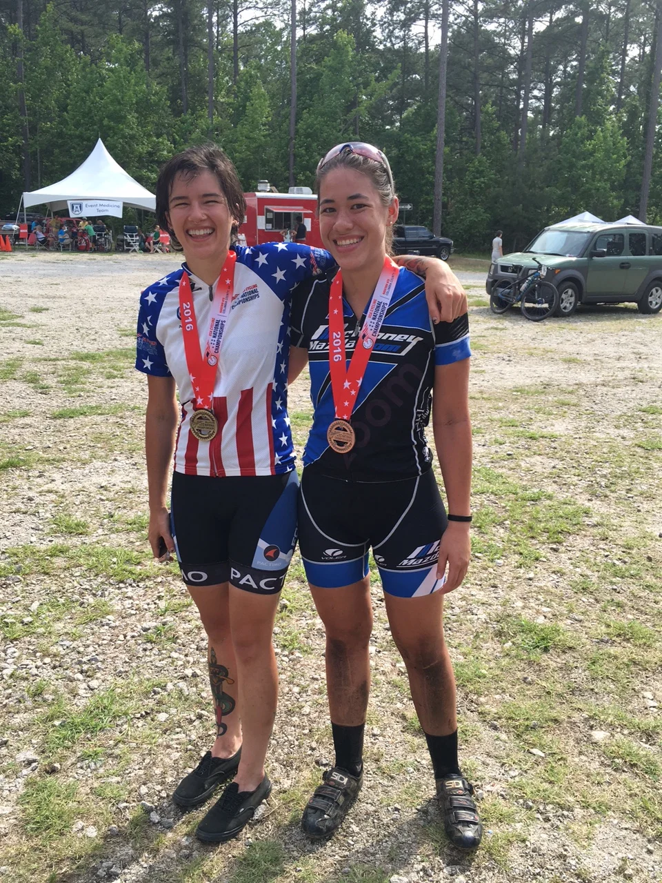 19-29 Marathon Mountain Bike National Champion Rhys May and her friend Elizabeth Lee celebrate after their podium finishes on Saturday. 