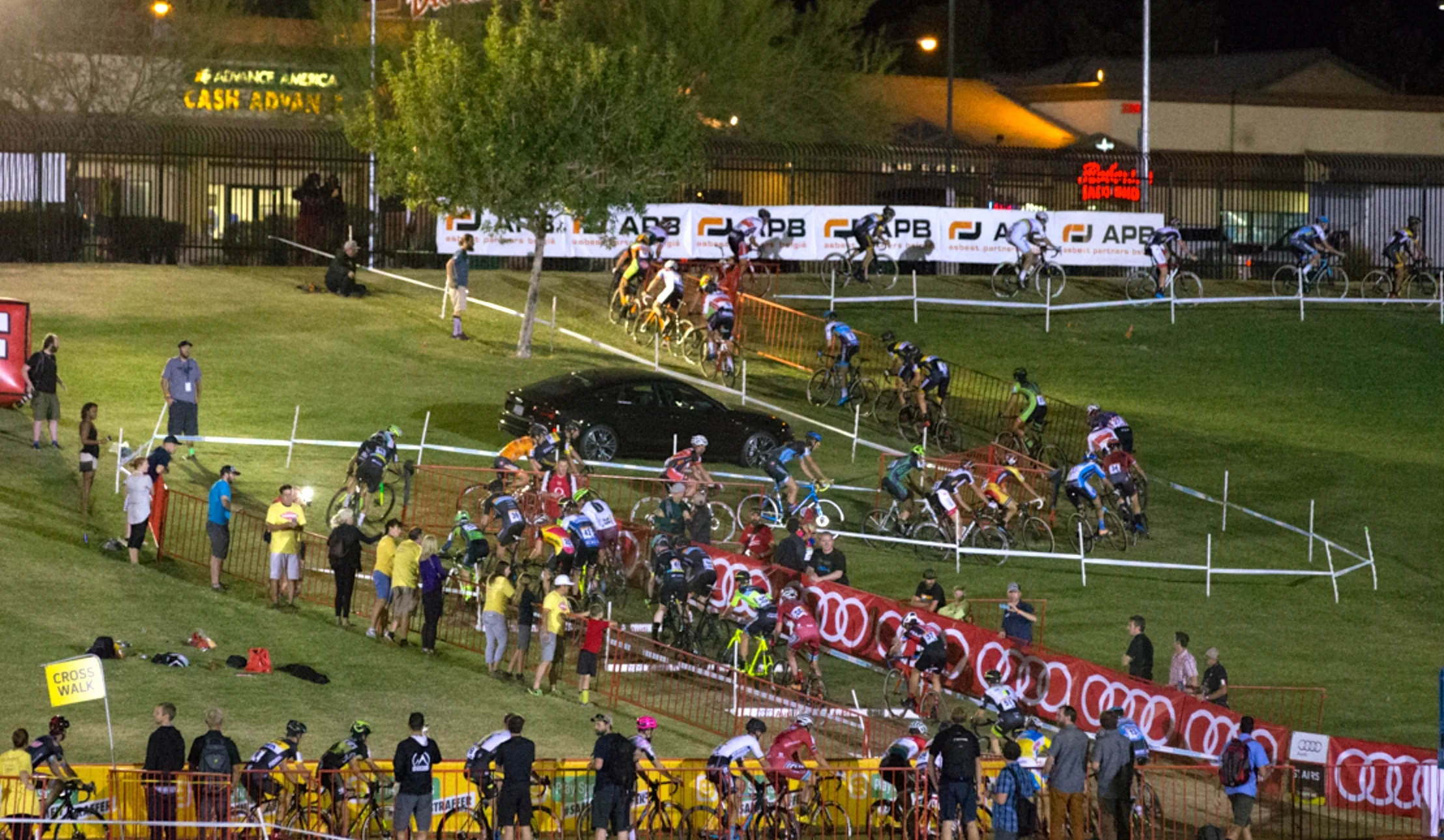 Smith, #42, hops the barriers on the first lap as the field starts to spread out behind.