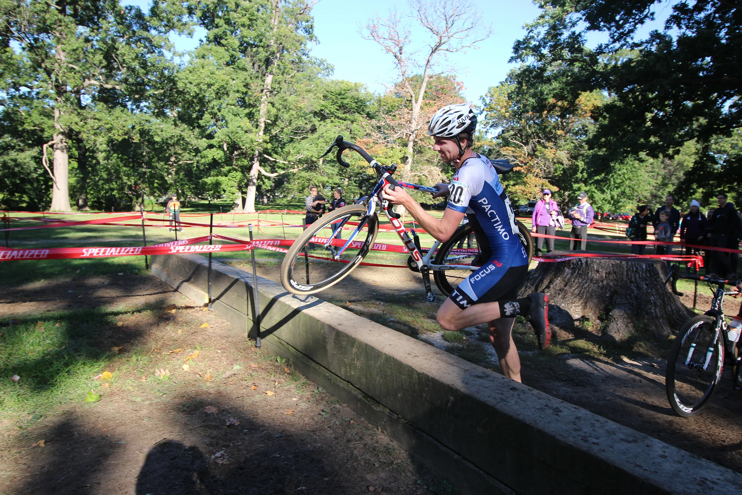 Jack Kisseberth jumps over the extra tall barriers on his way to 14th place at Charm City Cross on Sunday in Baltimore. Photo by Joie Chen.