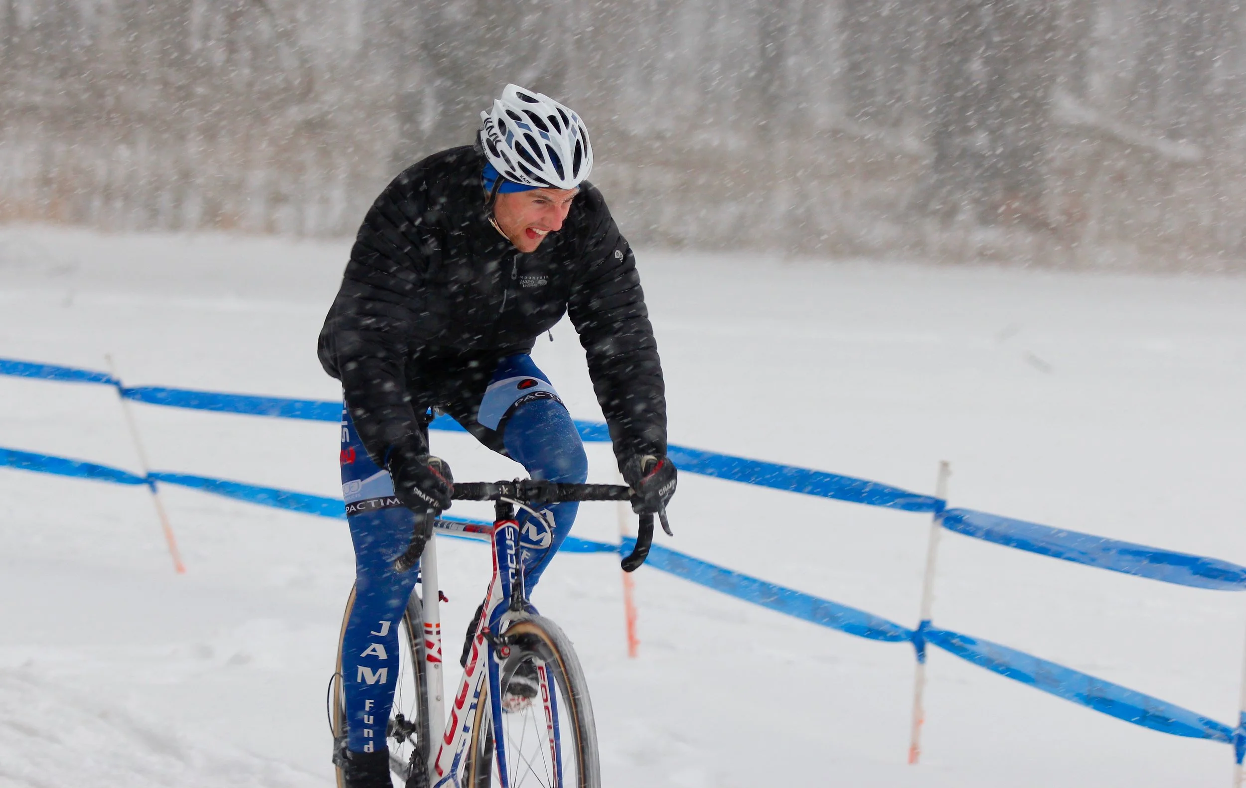 Jack Kisseberth rode the course on Saturday evening in advance of Sunday's championship race. Weather conditions were harsh. The snow was blowing sideways making visibility difficult. The snow is expected to stop before his elite race. Photo by Vicky Sama