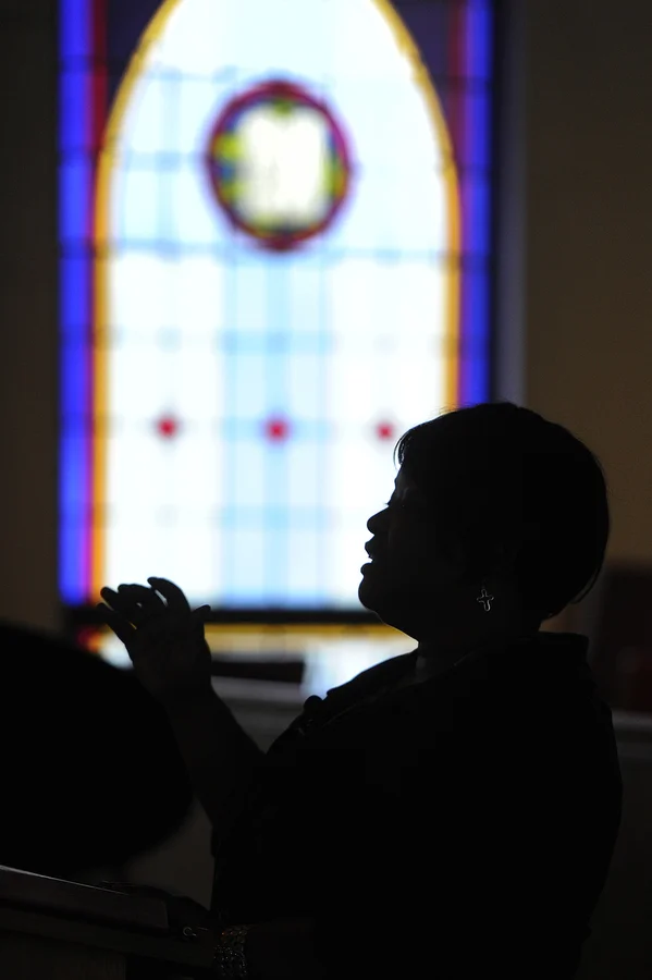 Pastor D.F. Barnwell leads the closing hymn during a service for the Lenten Luncheon series on Wednesday, March 19, 2014, at Cherryvale United Methodist Church in Staunton. Multiple area churches gather for the Lent services and raise money for SACRA, a local organization that provides economic assistance.