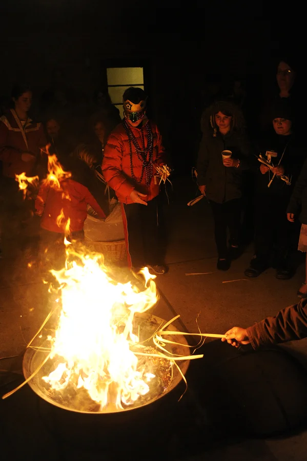Children burn palm leaves at the end of a Mardi Gras celebration at St. John the Evangelist Catholic Church on Tuesday, March 4, 2014, in Waynesboro. Mardi Gras, or "Fat Tuesday," is a feasting day before Ash Wednesday, which is a 40-day period of fasting and reflection before Easter. The palm leaves are from last year's Palm Sunday and once they are cooled, will be placed on people's foreheads for Ash Wednesday.