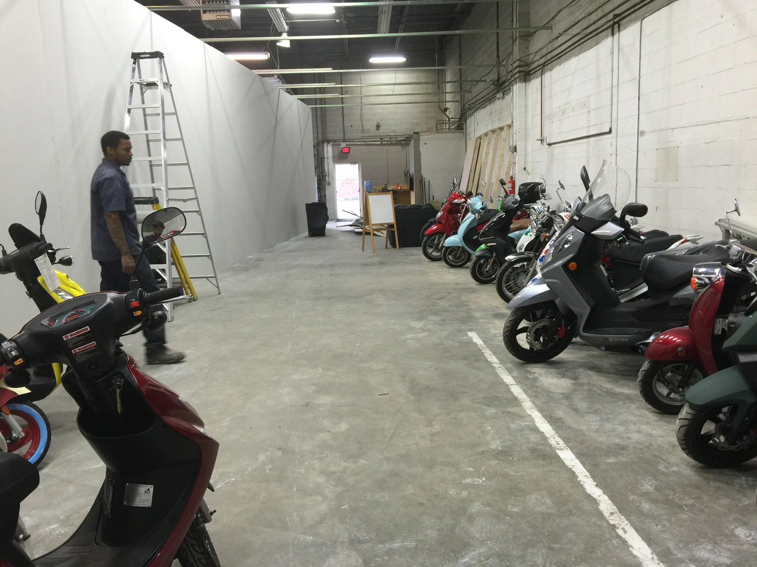 Getting things into place! This is our future showroom. The wall is up!