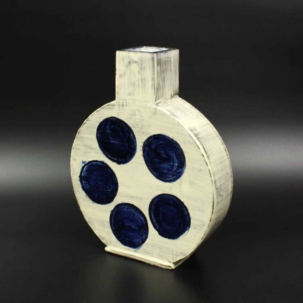 White Vase with Blue Polka Dots J.S. Herbert Stoneware, slip, and glaze 11 ½ x 9 ½ 2 ¾ in. Click image to enlarge ⦿ Inquire