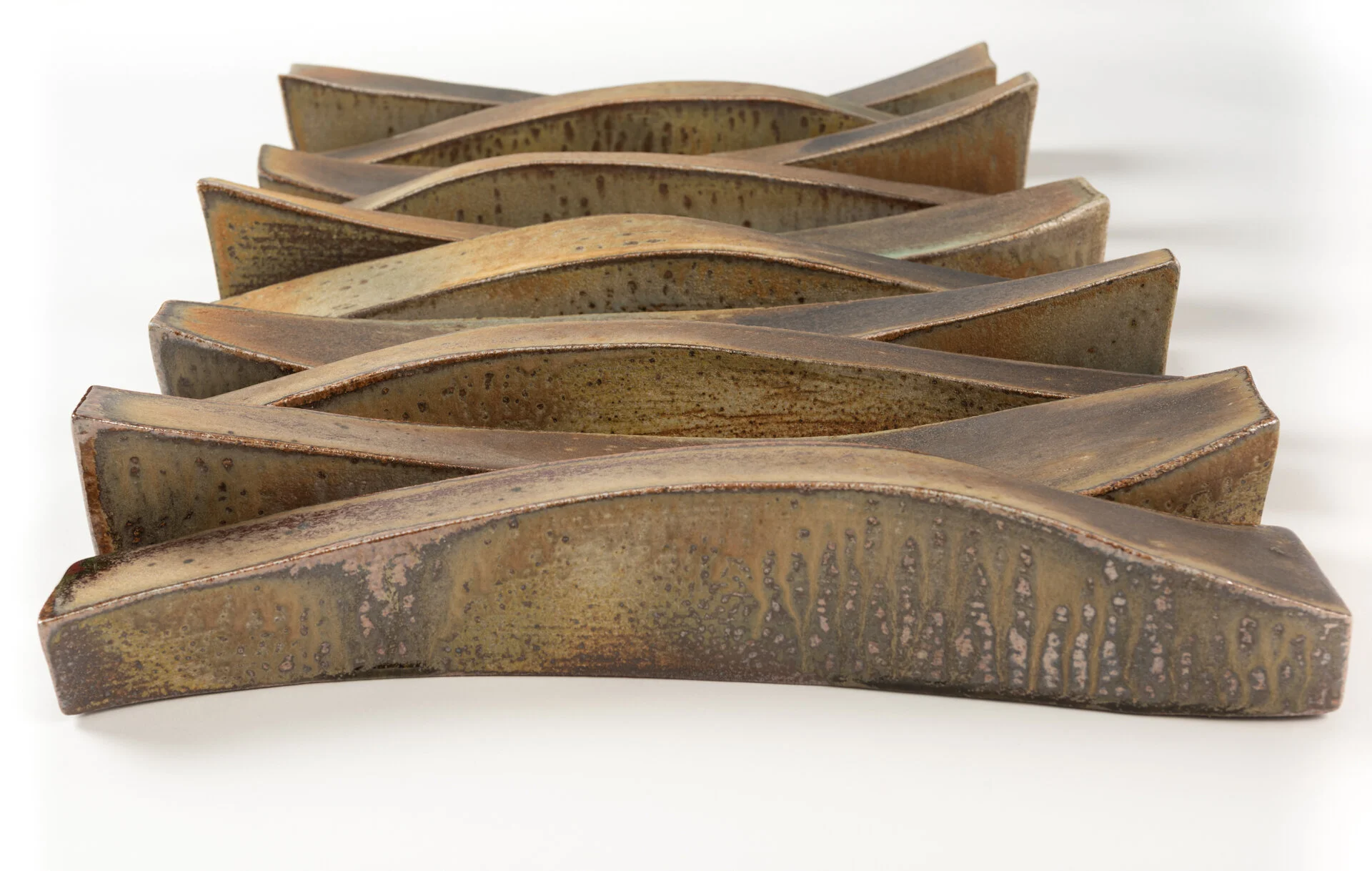 Layers Lisa Battle Ceramic (10-part wall sculpture) 20 x 33 x 4 in. Click image to enlarge ⦿ Inquire