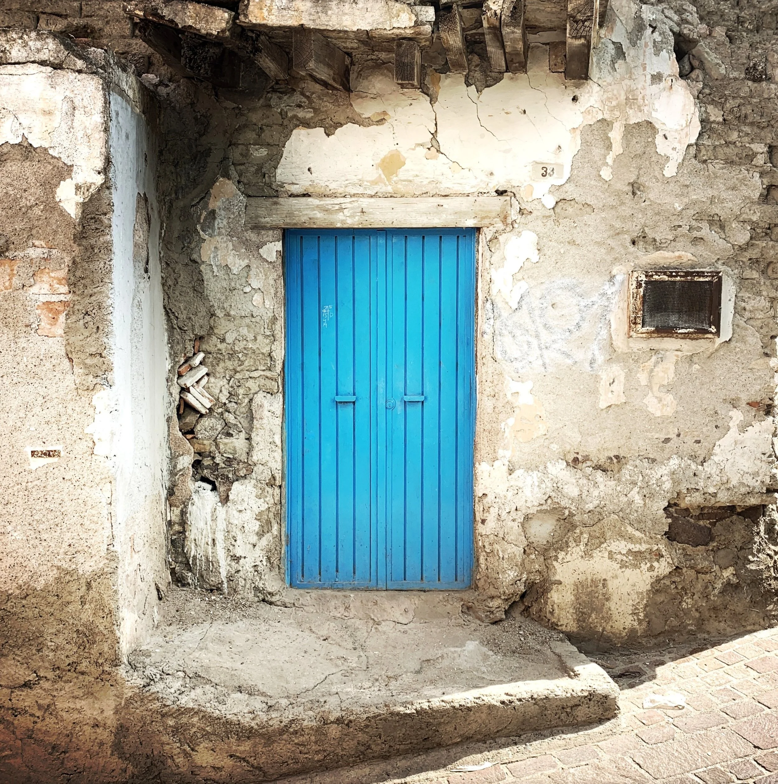 Susan Raines "Blue Door, Guanajuato, Mexico Archival Photograph Image Size - 11 x 11 inches Framed Size - 20 x 21 Click image to enlarge ⦿ Inquire