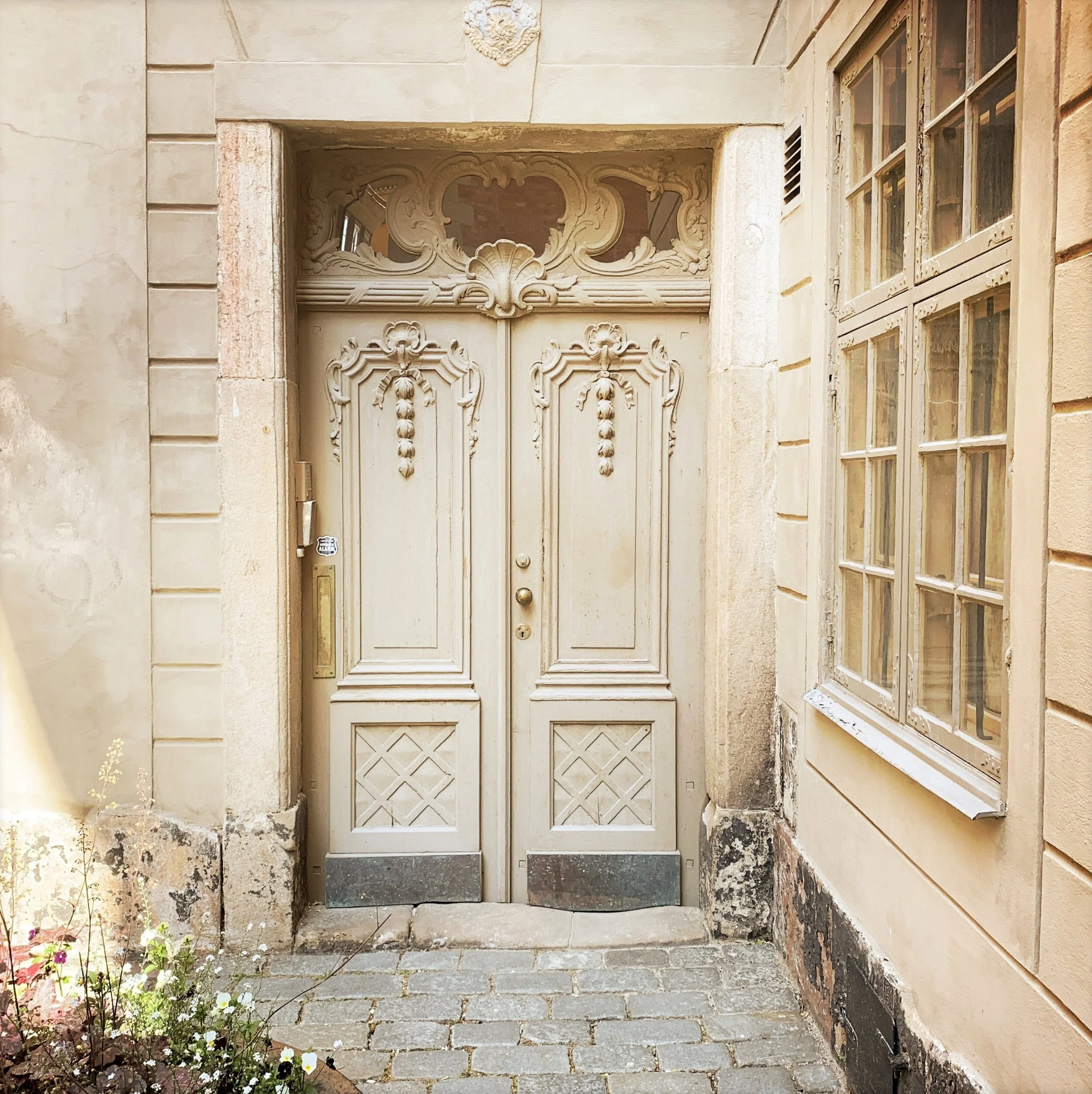 Susan Raines "White Doors, Stockholm" Archival Photograph Image Size - 11 x 11 inches Framed Size - 20 x 21 inches Click image to enlarge ⦿ Inquire