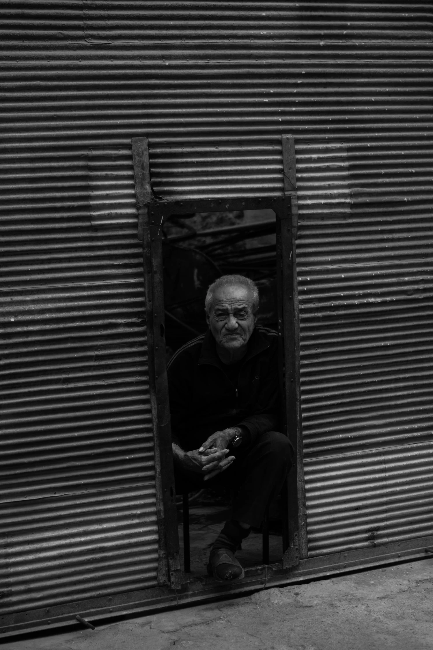 Man in Wall Jeremy Limerick Photograph Click image to enlarge ⦿ Inquire