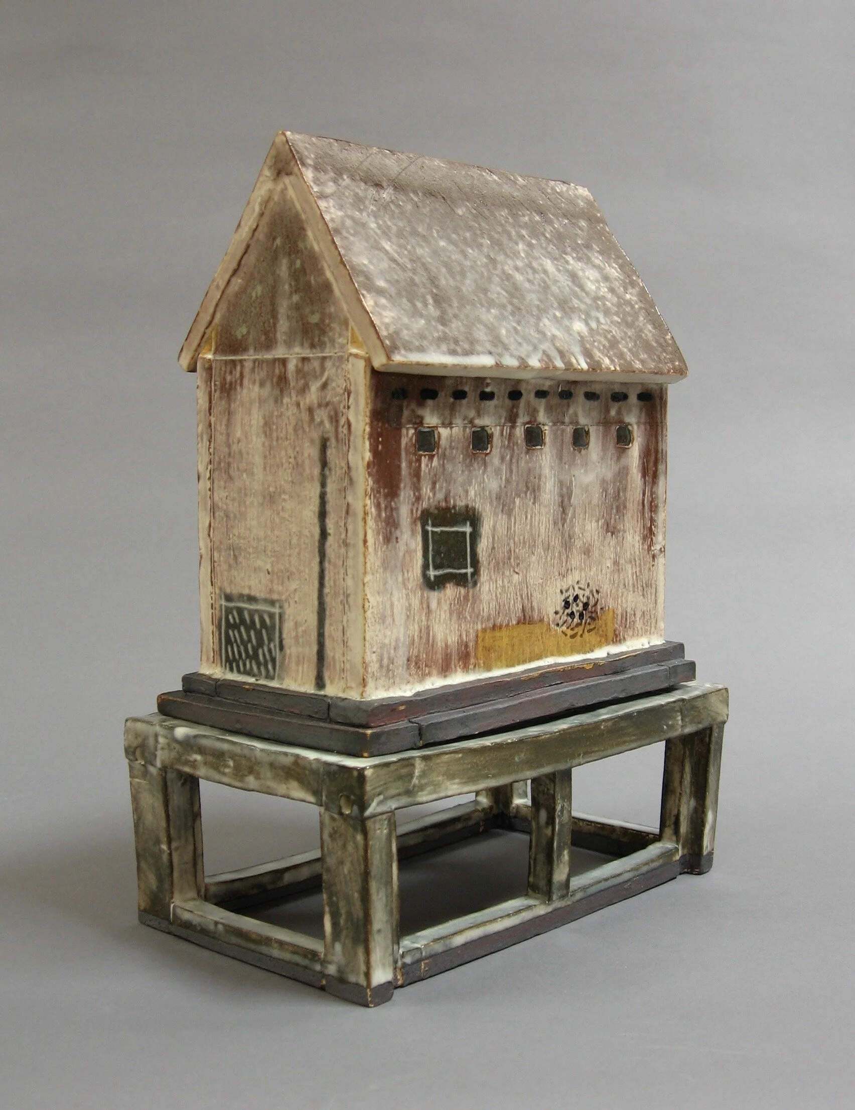 Closed Building with Black Windows and Stand&nbsp; William Bowser Ceramic 10 x 7 ½ x 4 ½ in. Click image to enlarge ⦿ Inquire
