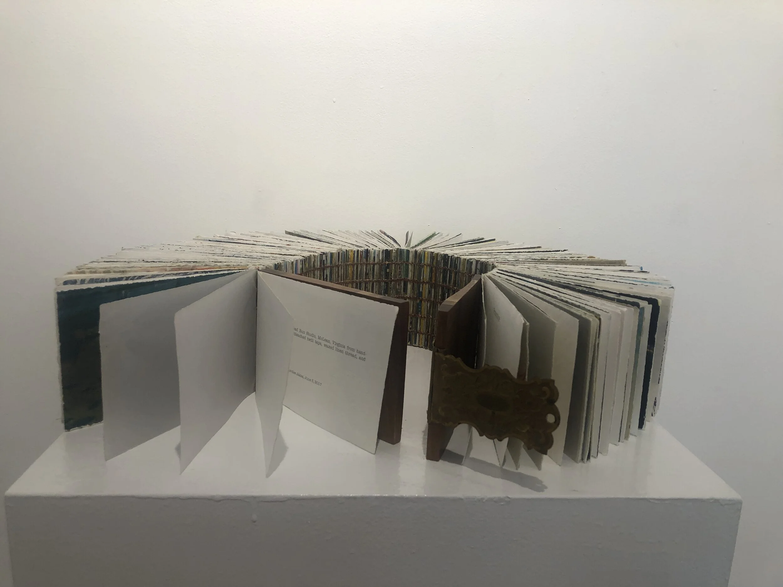 Practice Carolee Jakes Handmade book: Coptic binding with mahogany covers and found latch. Pages are comprised of selected print fragments. Click image to enlarge ⦿ Inquire