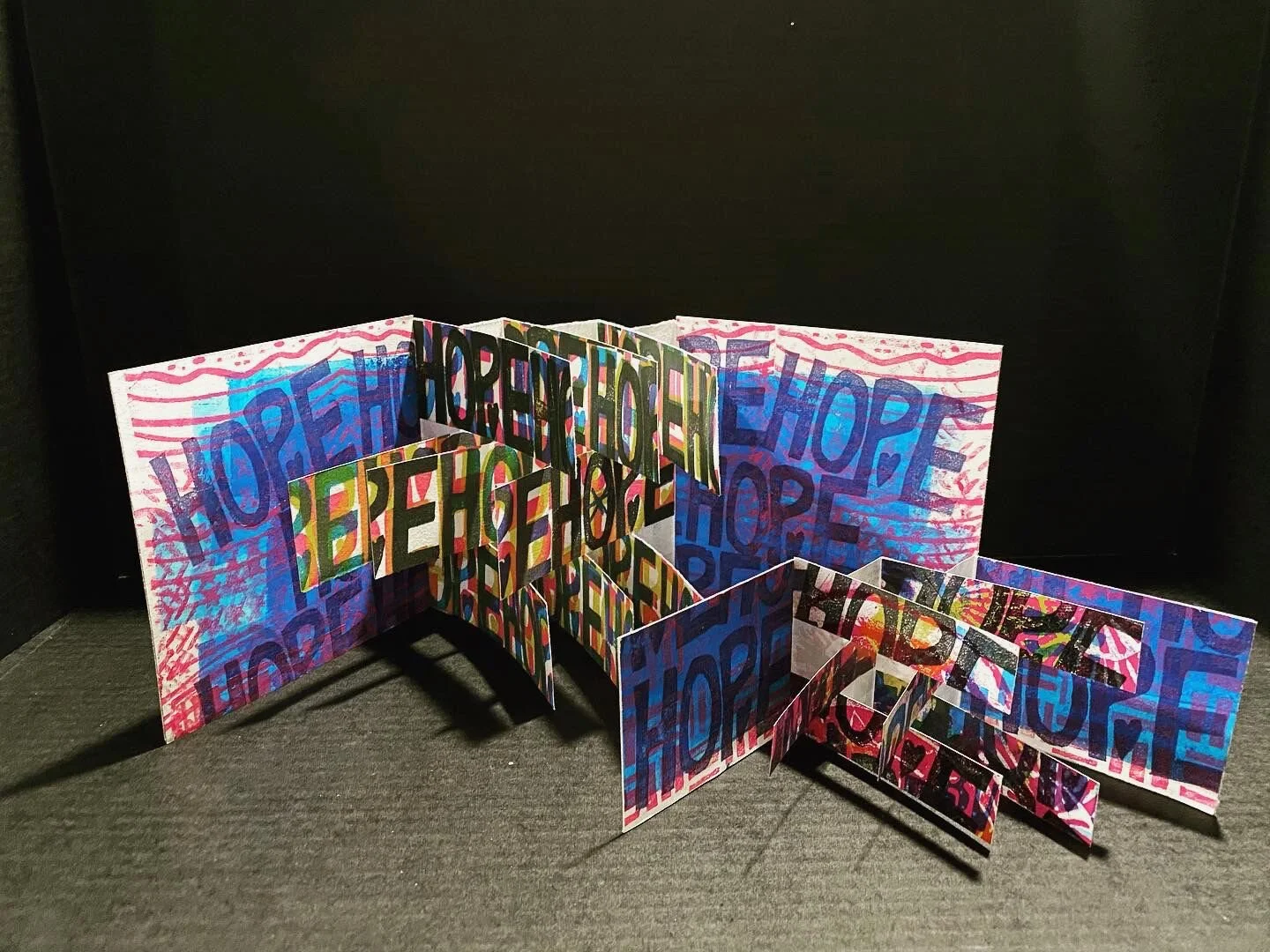 Hope Sarah Matthews Block Printed Flag Books 5” x 5” closed $150 Click image to enlarge ⦿ Inquire