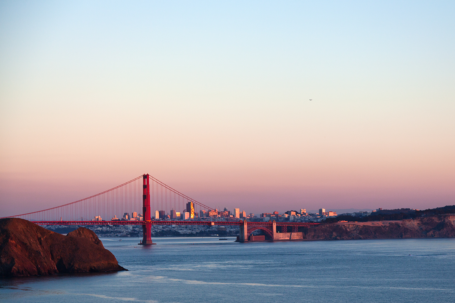 golden gate bridge pink sky at dusk san francisco travel photographer.jpg