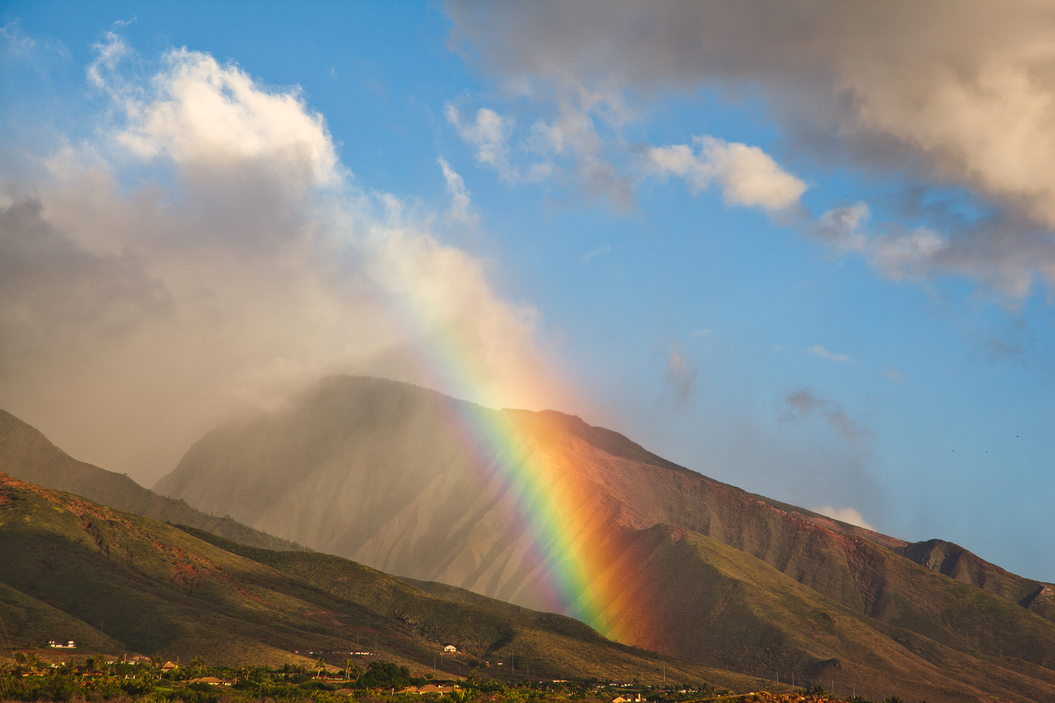 rainbow-in-valley-travel-photographer.jpg