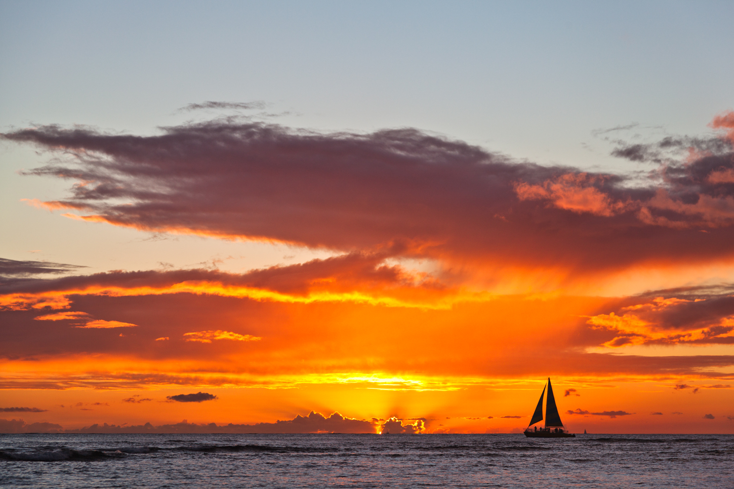sailboat-on-the-horizon-at-sunset-travel-photographer.jpg