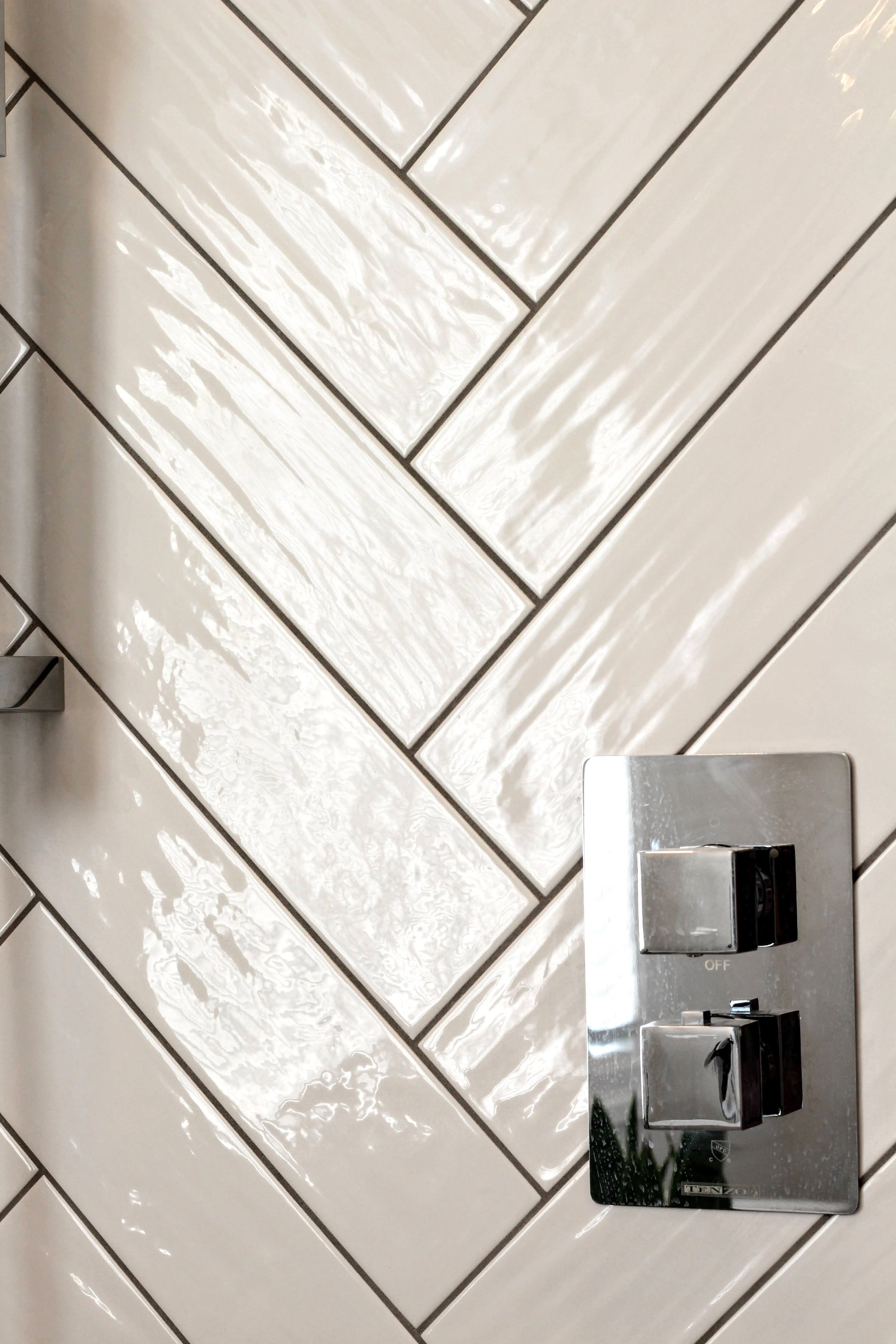 Ensuite design and decorating project with herringbone tiles