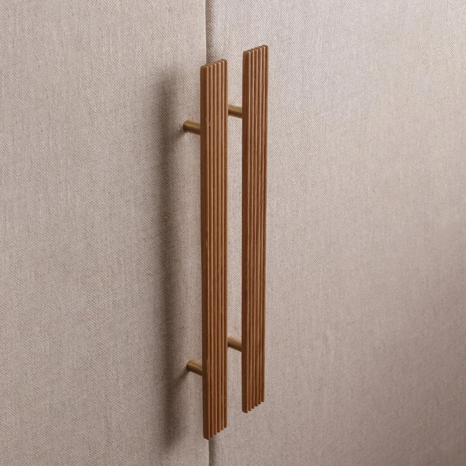 Wooden coat rack mounted on a beige wall.
