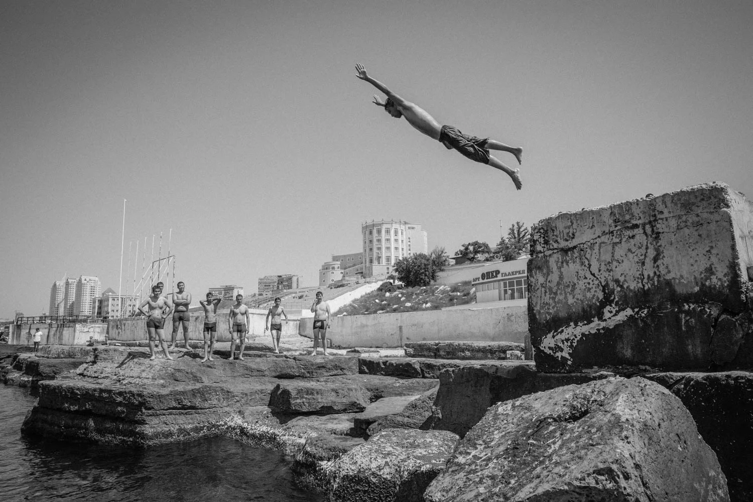 Diving boys, Aktau, Kazakhstan