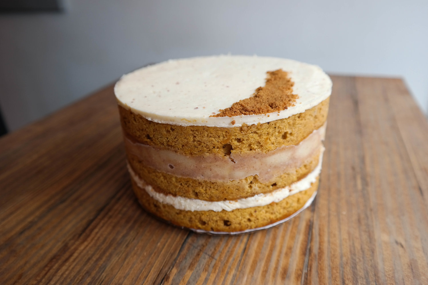   Pumpkin Brown Butter Cake - pumpkin cake layered with brown butter cream cheese frosting and spiced pear compote (seasonal: available October-January) 