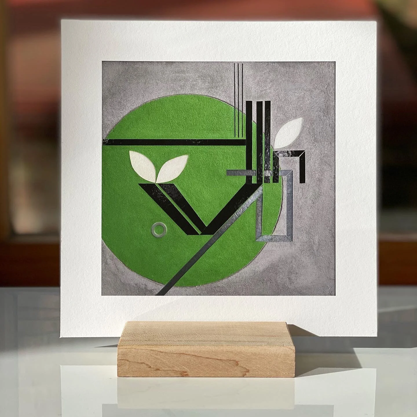 thrive green on stand.jpg