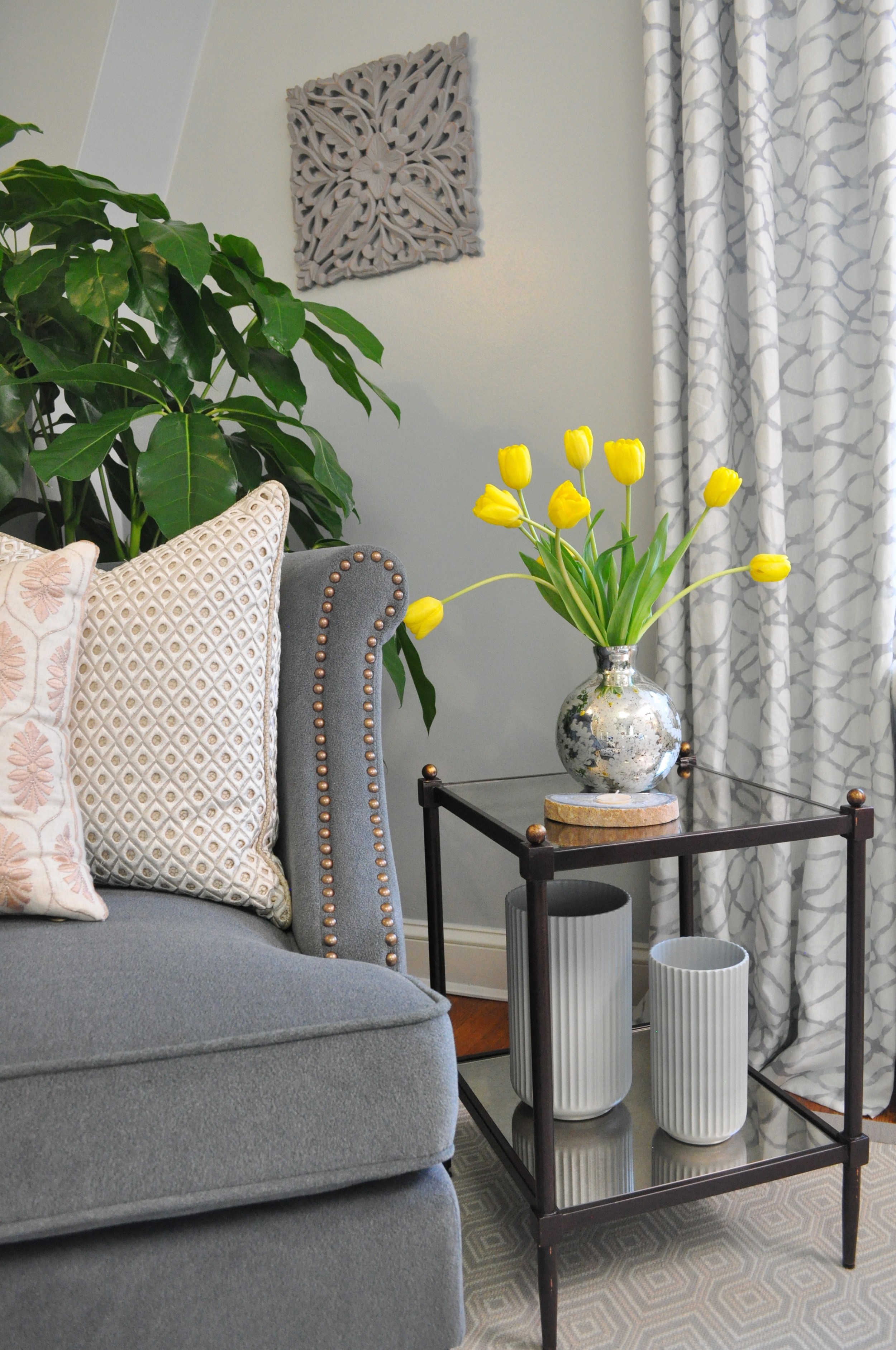 Kim Mitchell Design Lead_HGTV_Buying and Selling with The Property Brothers_Season 5_Episode 8_Bedroom_Side Table_Chair_Tulips_Kontrast Vases_8_31_2016.jpg