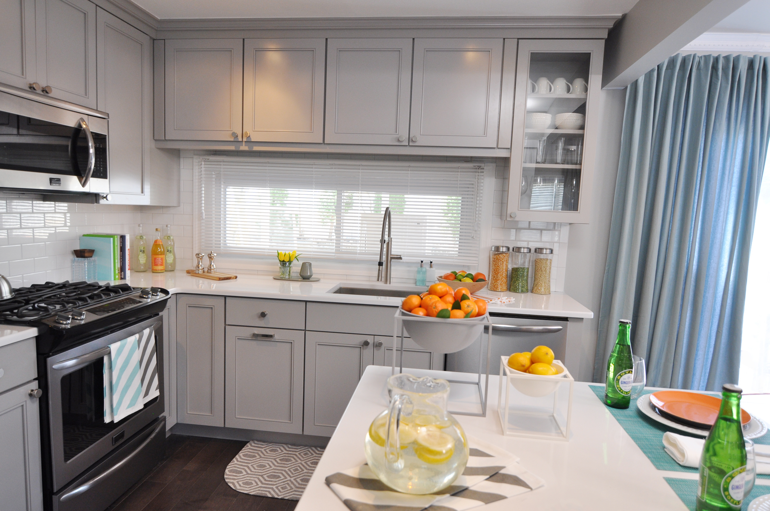 Kim Mitchell_Production Designer_HGTV_Buying and Selling with The Property Brothers_Season 3_Episode 316_Kitchen Remodel_Grey Kitchen Cabinets_Kitchen Staging.jpg