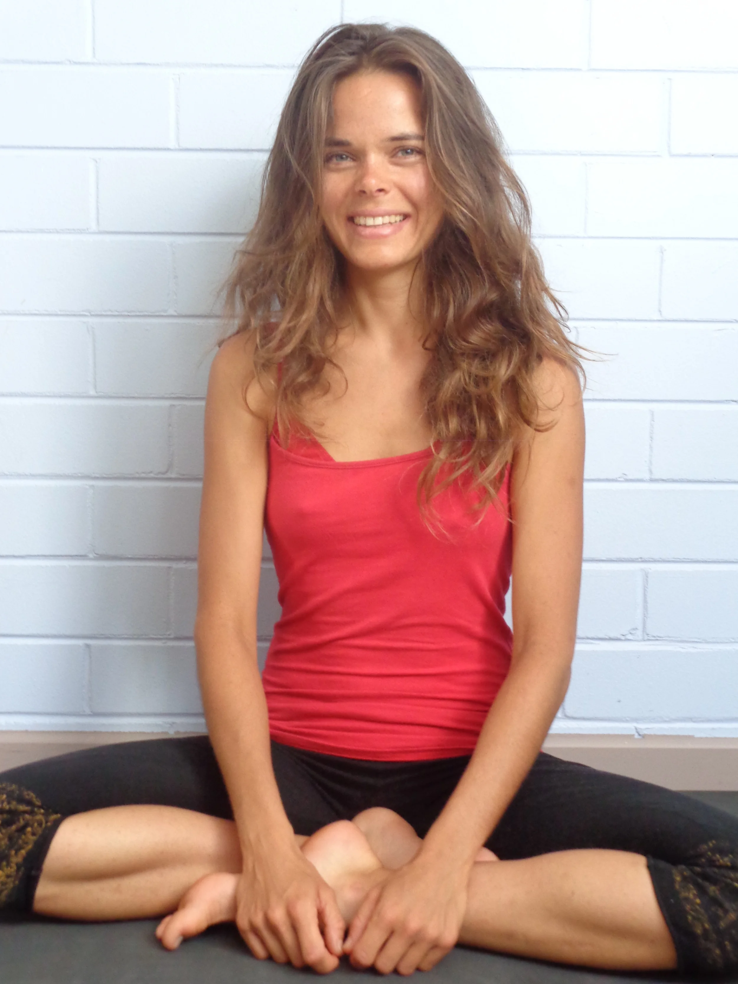 Meet Mavra on Sundays for Candlelight Yoga
