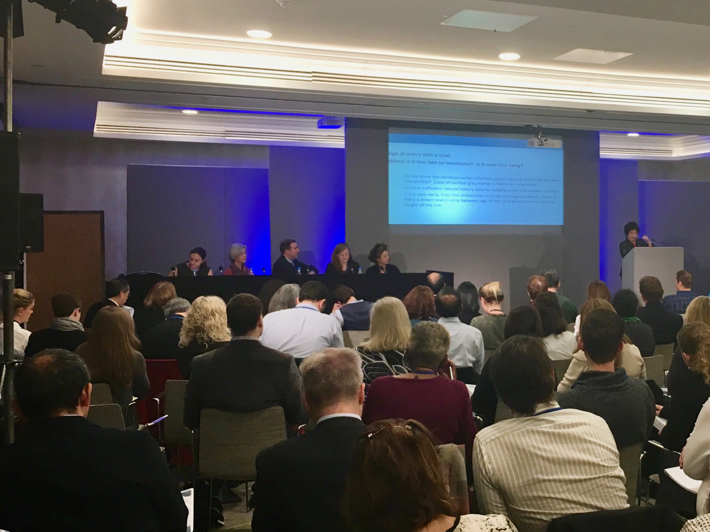 Dr. Elsa Shapiro presents. Dr. Patroula Smpokou, FDA; Dr. Hanneke van der Lee, Academic Medical Center, Amsterdam, The Netherlands ; Dr. Darren Janzen, Oregon Health Science University, United States; Kate Delaney, Shapiro & Delaney LLC; and Dr. Caroline Auriche, EMA on stage. 