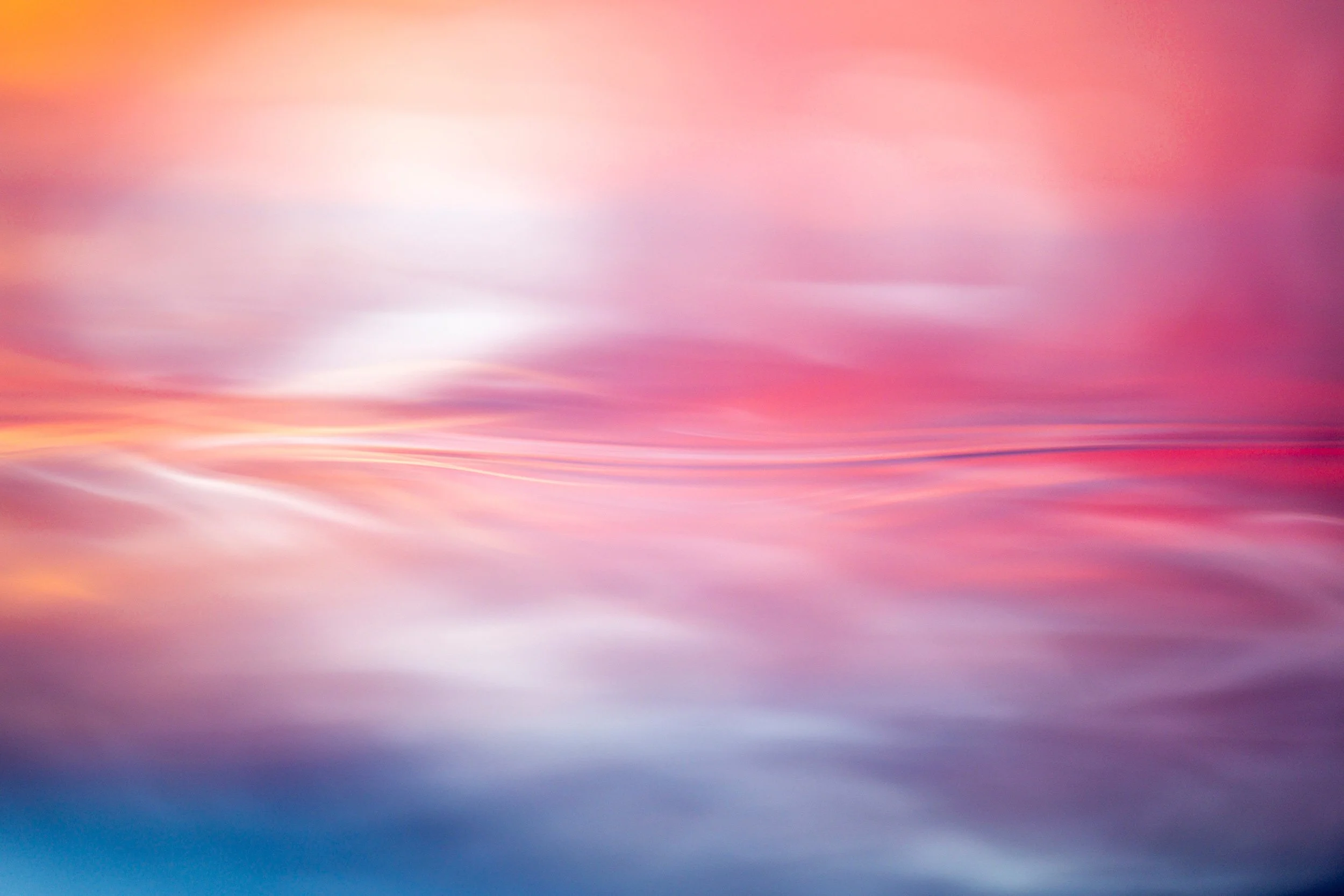 Beautiful pastel colours dance on the oceans surface at sunrise, from the Sealevel collection of fine art photography prints by Ted Grambeau.