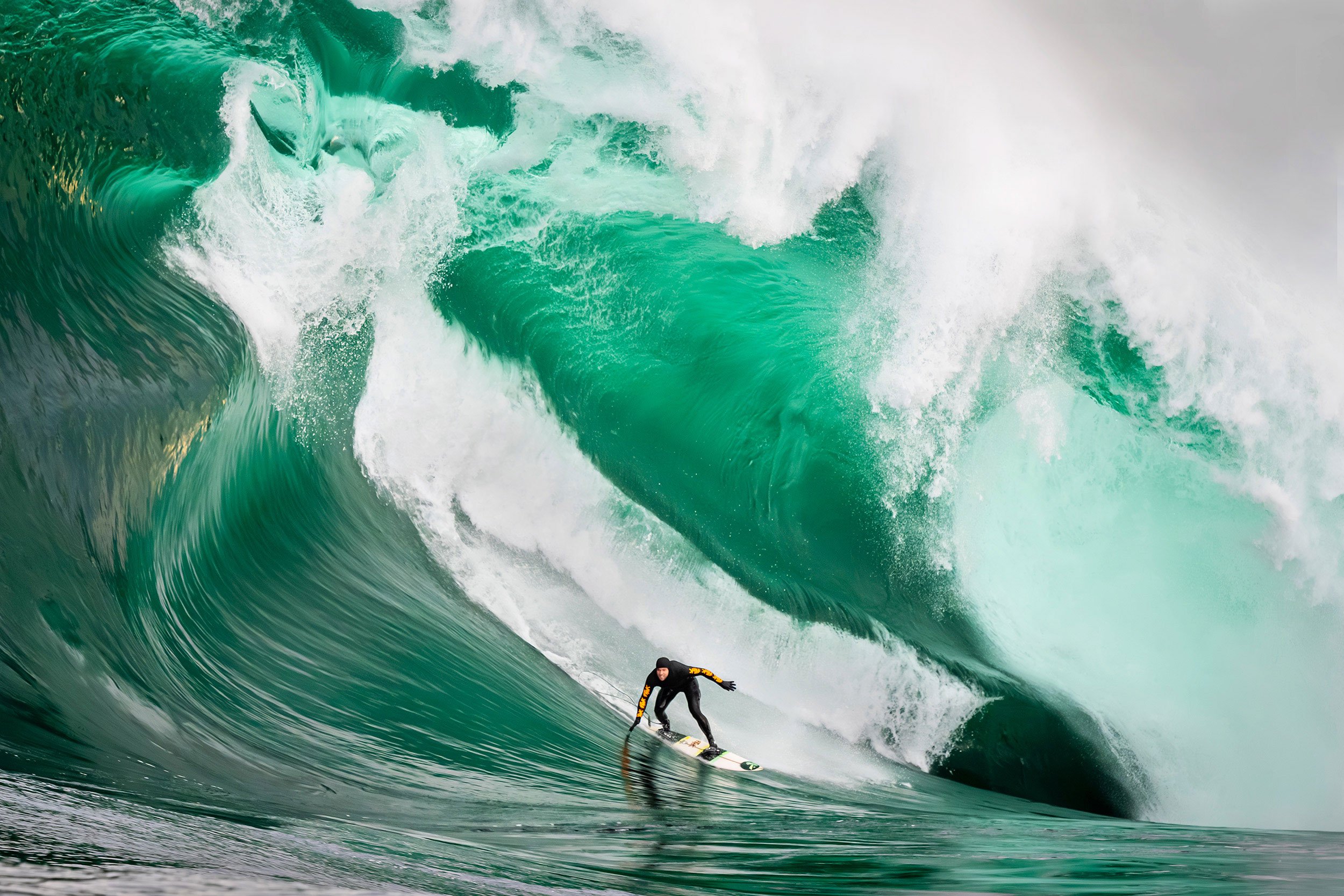 Mind over Monster is an award winning photograph of James McKean conquering the beast at Shipstern Bluff, Tasmania, Australia, captured by Ted Grambeau.