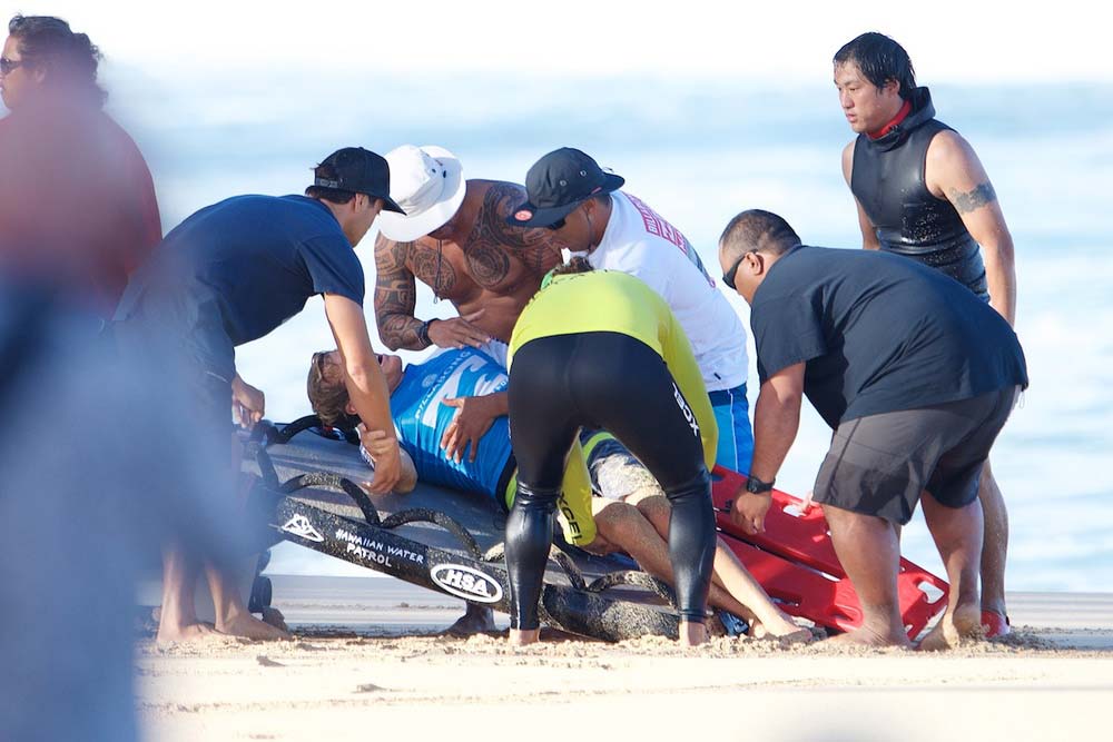   ^ THE RESCUE  Fast action by the water rescue team delivered Durbo safely to the beach before being rushed to hospital. I can't even imagine how much pain he was in. After visiting Bede in hospital back on the Gold Coast, he tells me it was the kin
