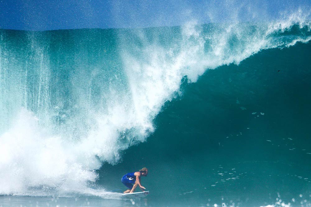   ^ OWEN WRIGHT AT PIPE  Laying down a critical bottom turn under a threatening Pipeline lip to set a line for his usual barrel fest. Owen Wright, known for being a consistent charger – In my personal opinion I believe Owen was the best surfer in 201