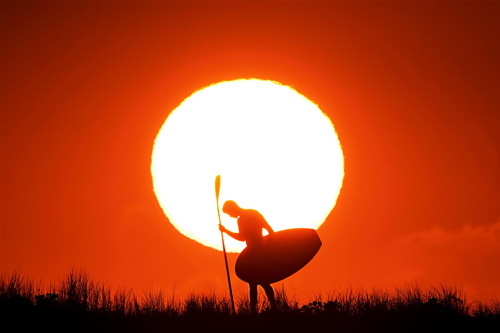  LIFESTYLE VIBE SILHOUETTE Sunrise silhouette with lifesaver waterman Jayden Jensen 