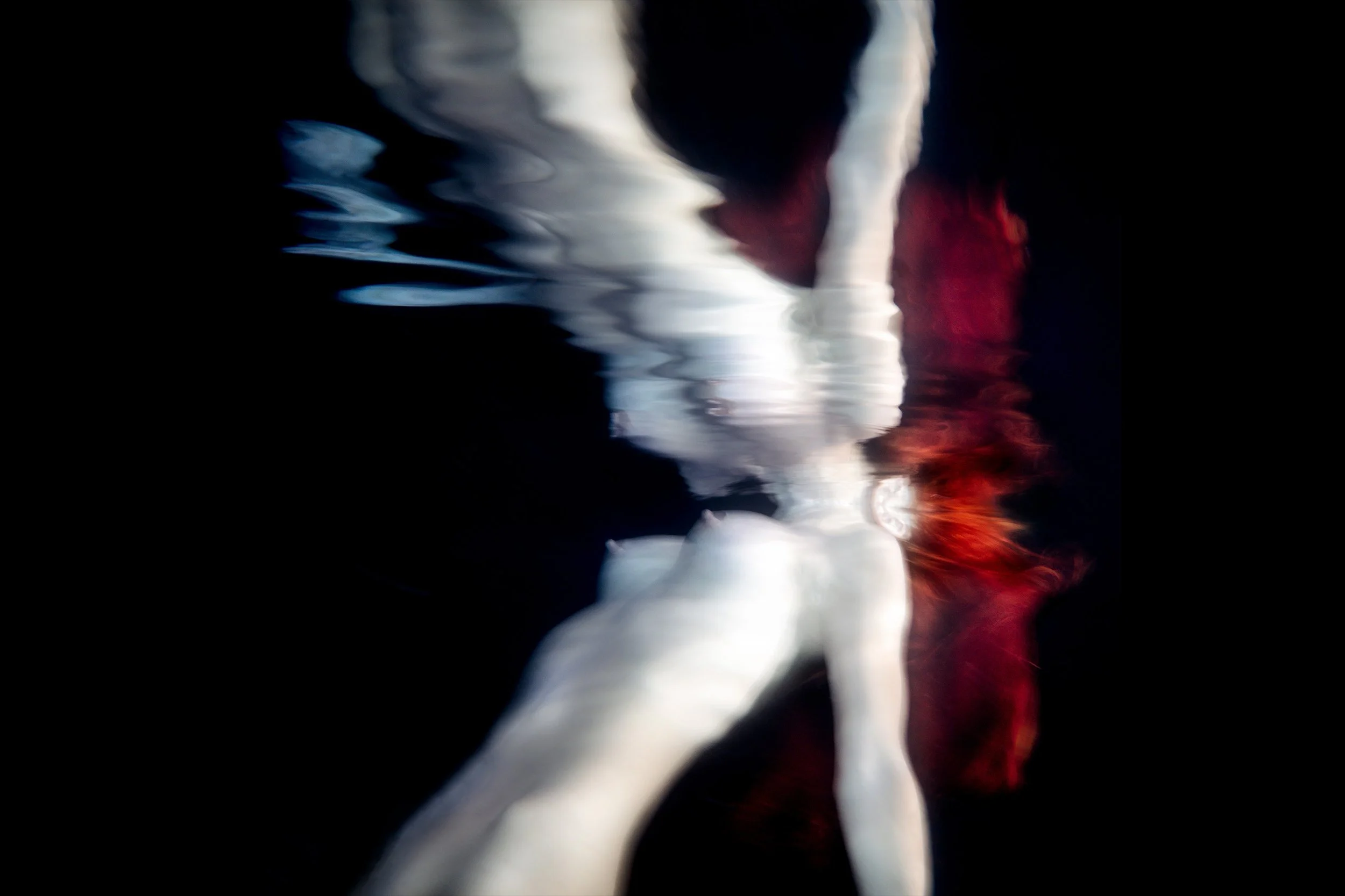 ANGELIC ECHO - “A silent reflection drifts beneath the surface, where light meets its twin.” from Ted Grambeau underwater VENUS portraits.