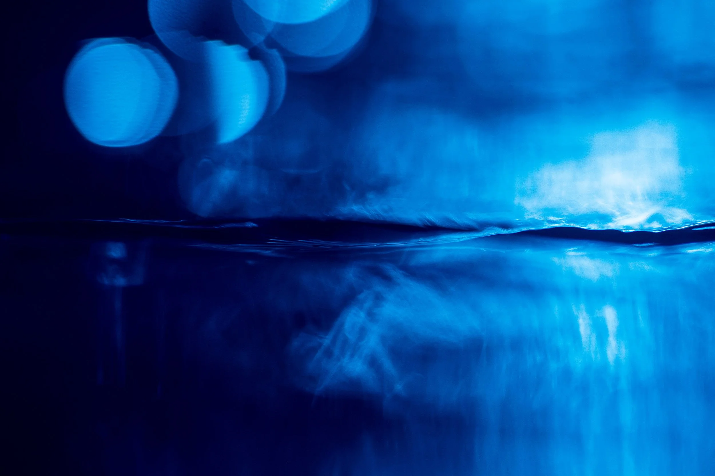 Stunning colours of indigo as light dances on the oceans surface, Sealevel Ocean Art by photographed by Ted Grambeau.